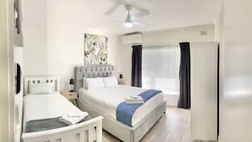 2 bedrooms, desk, iron/ironing board, travel cot