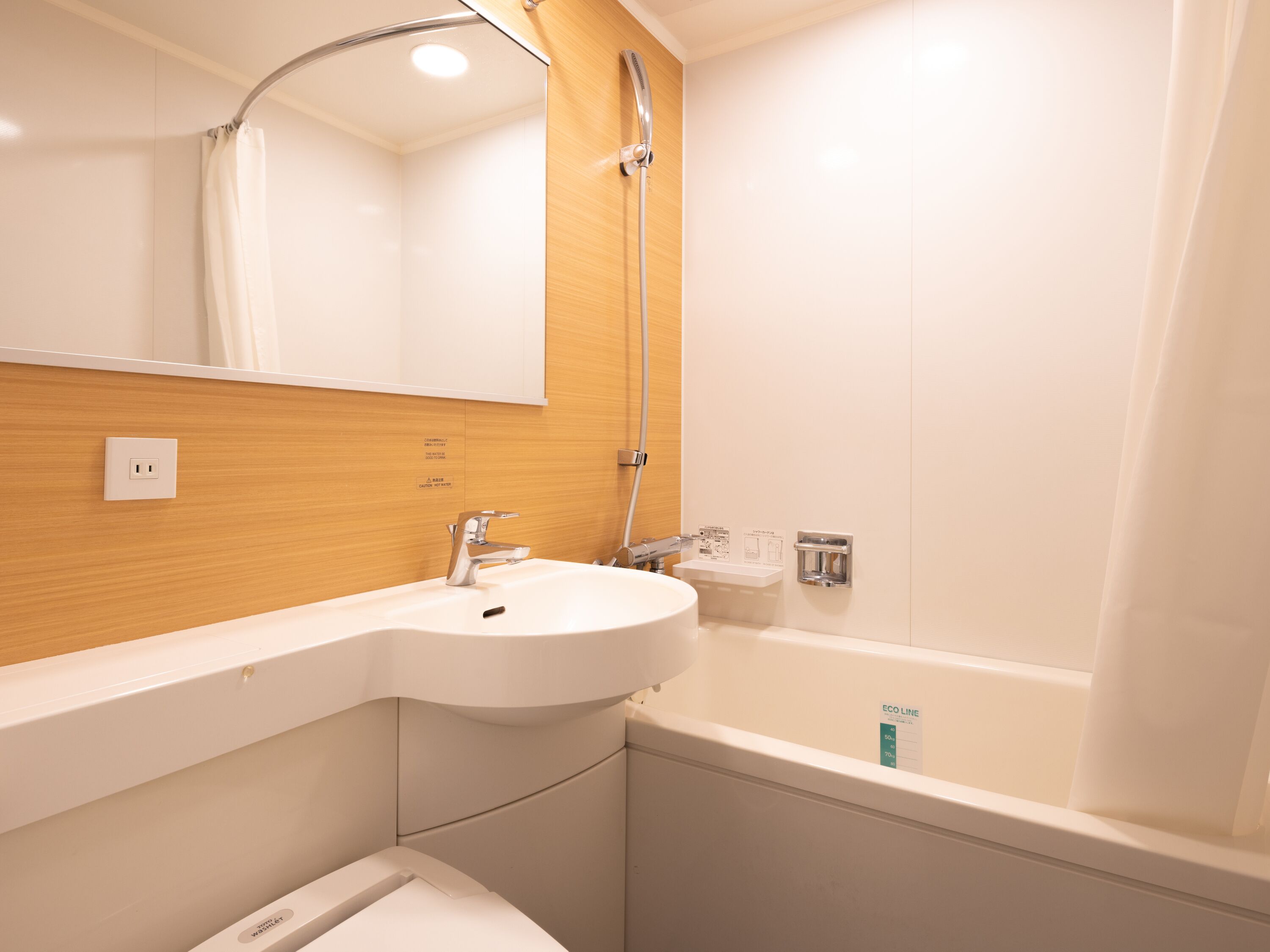 free toiletries, hair dryer, slippers, electronic bidet