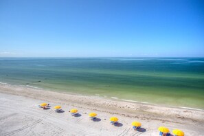 On the beach, beach towels, motor boating