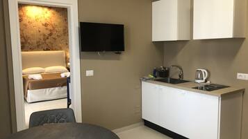 Maison mitoyenne | Coin séjour | Télévision LED de 32 pouces avec chaßnes par cùble, télévision