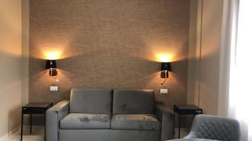 Junior Townhome | Living area | 32-inch LED TV with cable channels, TV