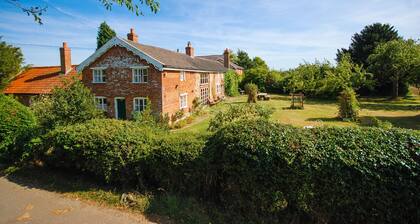 A romantic little Farm cottage with a roaring fire. Ideal for dog owners.