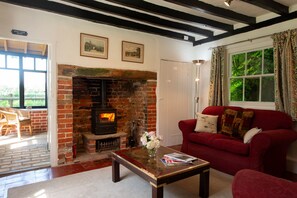 Smart TV, fireplace, books, offices