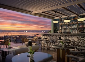Rooftop bar, ocean views, open daily