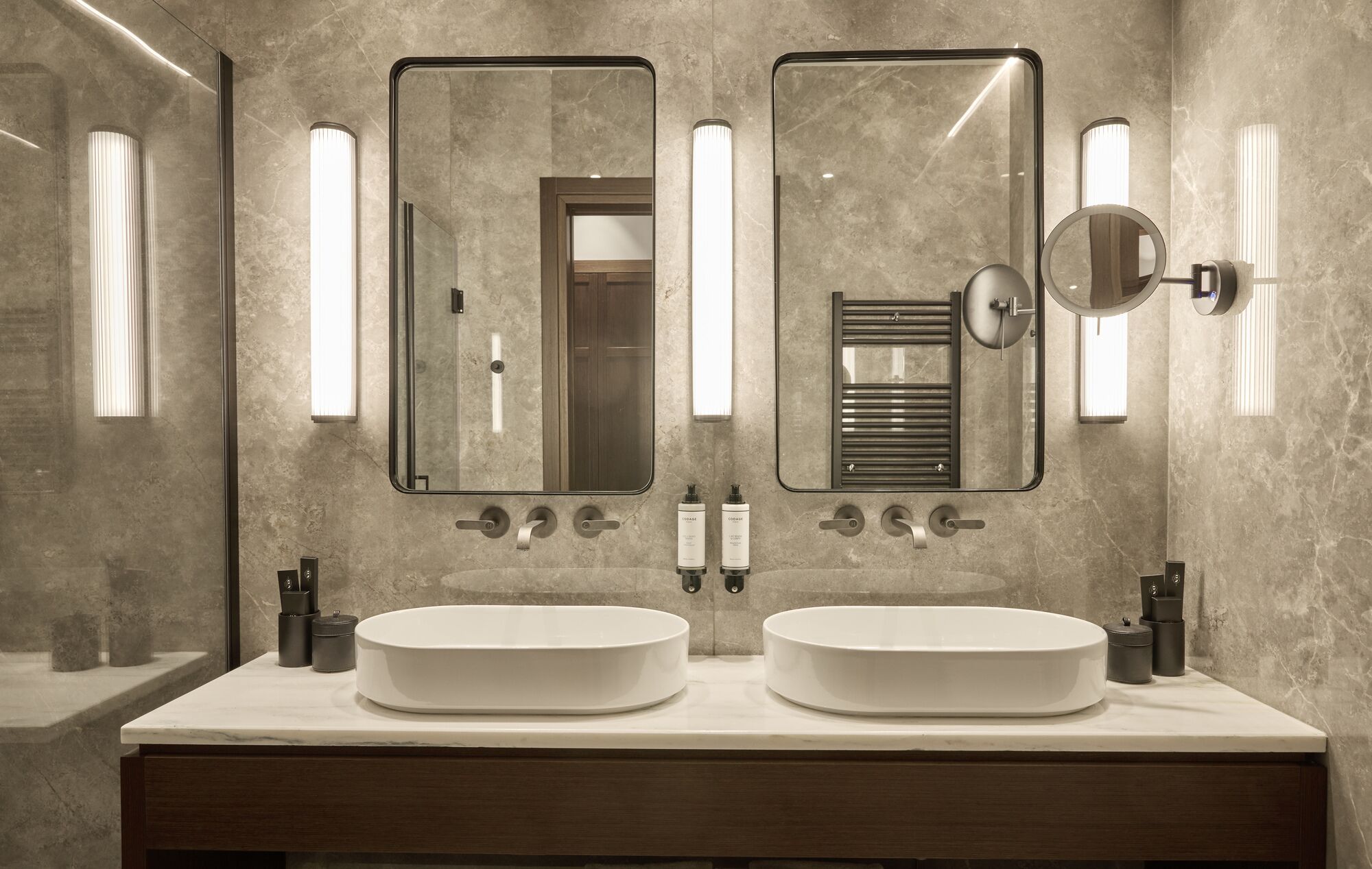 junior suite sea front with balcony | bathroom | rainfall showerhead, eco-friendly toiletries, bathrobes, slippers