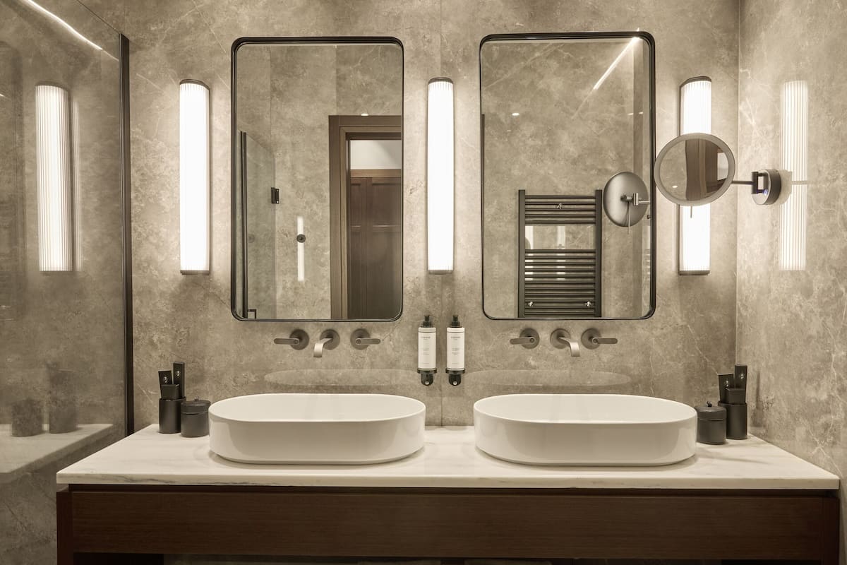 junior suite sea front with balcony | bathroom | rainfall showerhead, eco-friendly toiletries, bathrobes, slippers