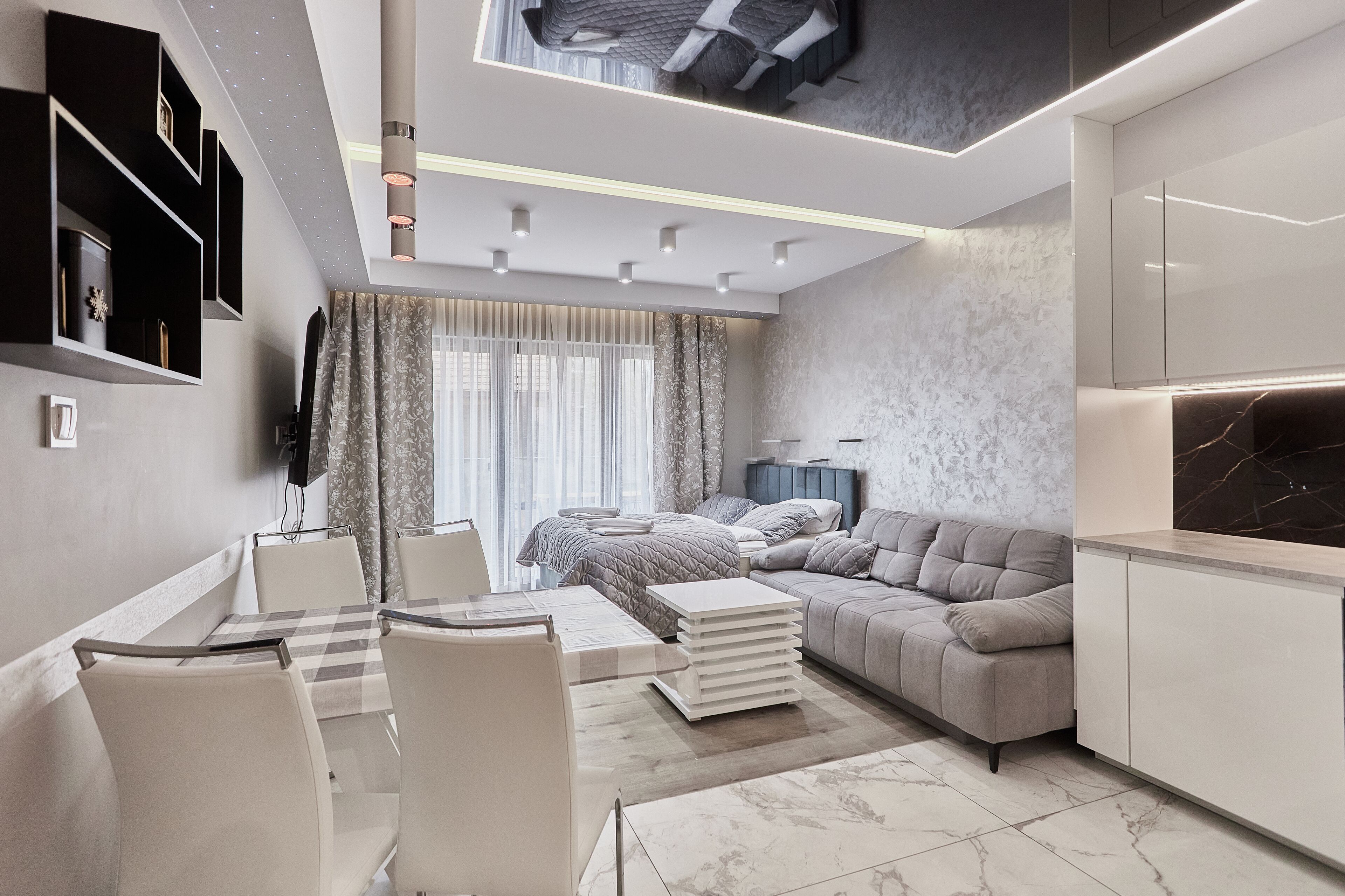 Exclusive Apartment | Living area | 40-inch flat-screen TV with digital channels, TV