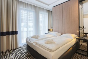Apartament estàndard | 1 dormitori, planxa i posts de planxar, wifi gratuïta i roba de llit 