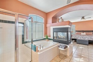 Combined shower/bathtub, hair dryer, towels, soap