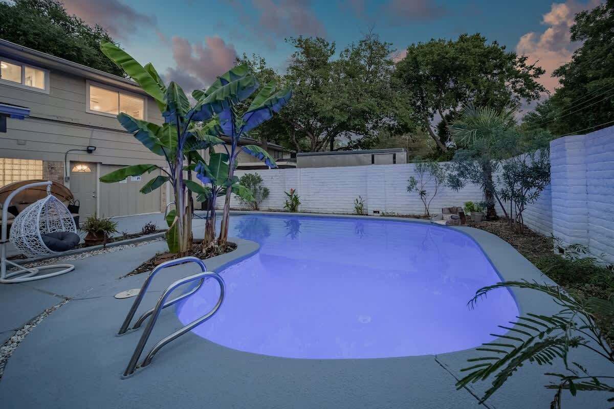 Your private backyard oasis with a sparkling pool and tall palm trees. We try to keep the pool open all year. Send us a message for our pool schedule.