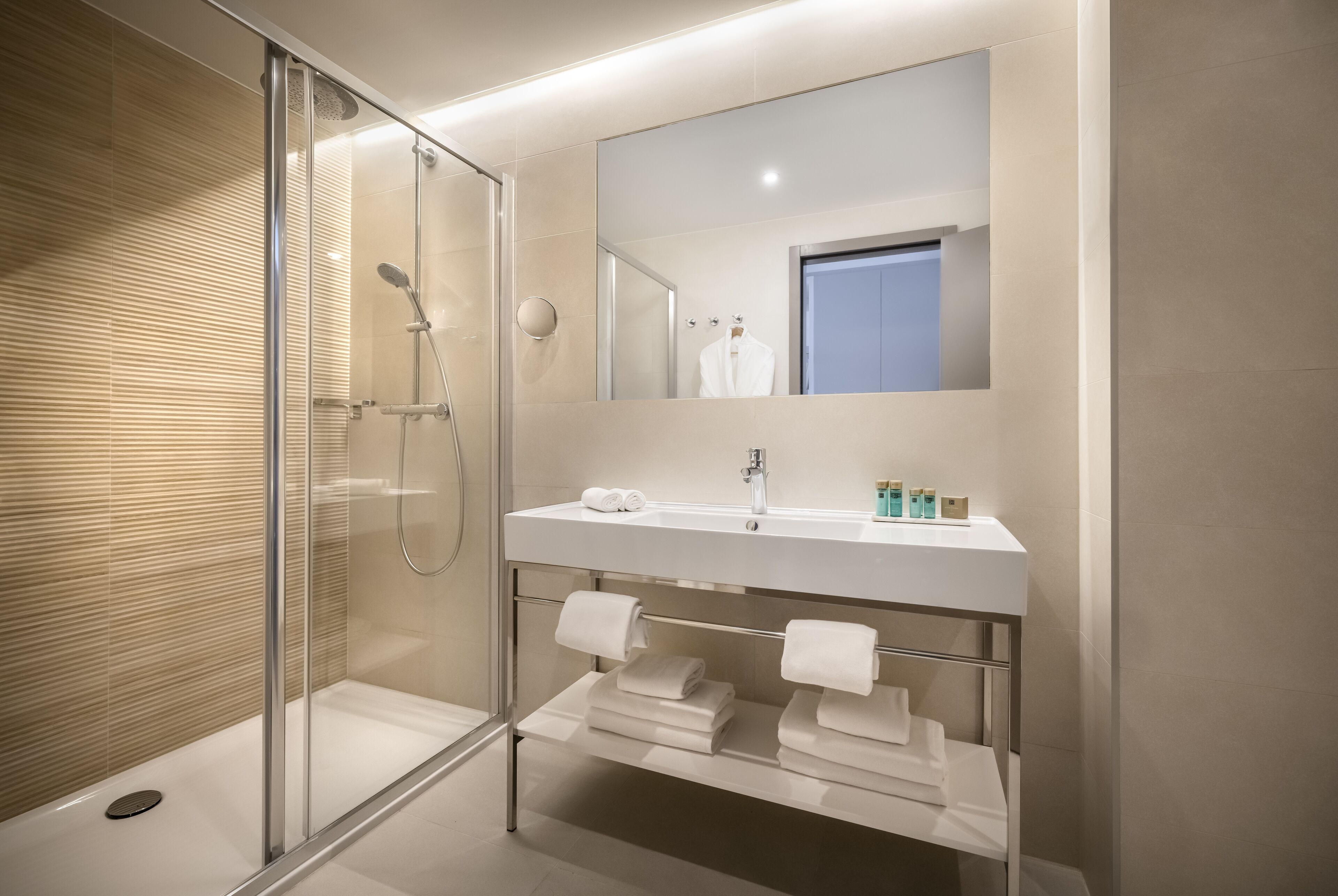 hair dryer, towels, soap, shampoo