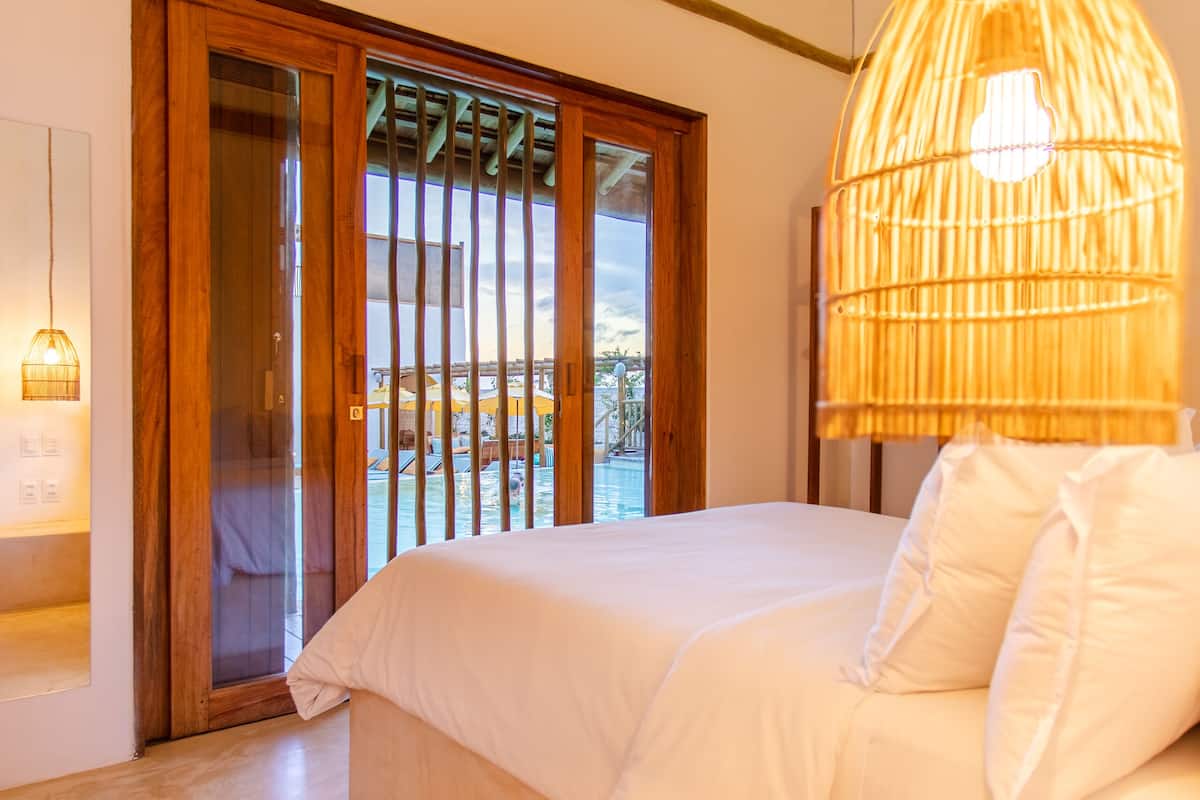 suite pool view | 1 bedroom, premium bedding, minibar, in-room safe