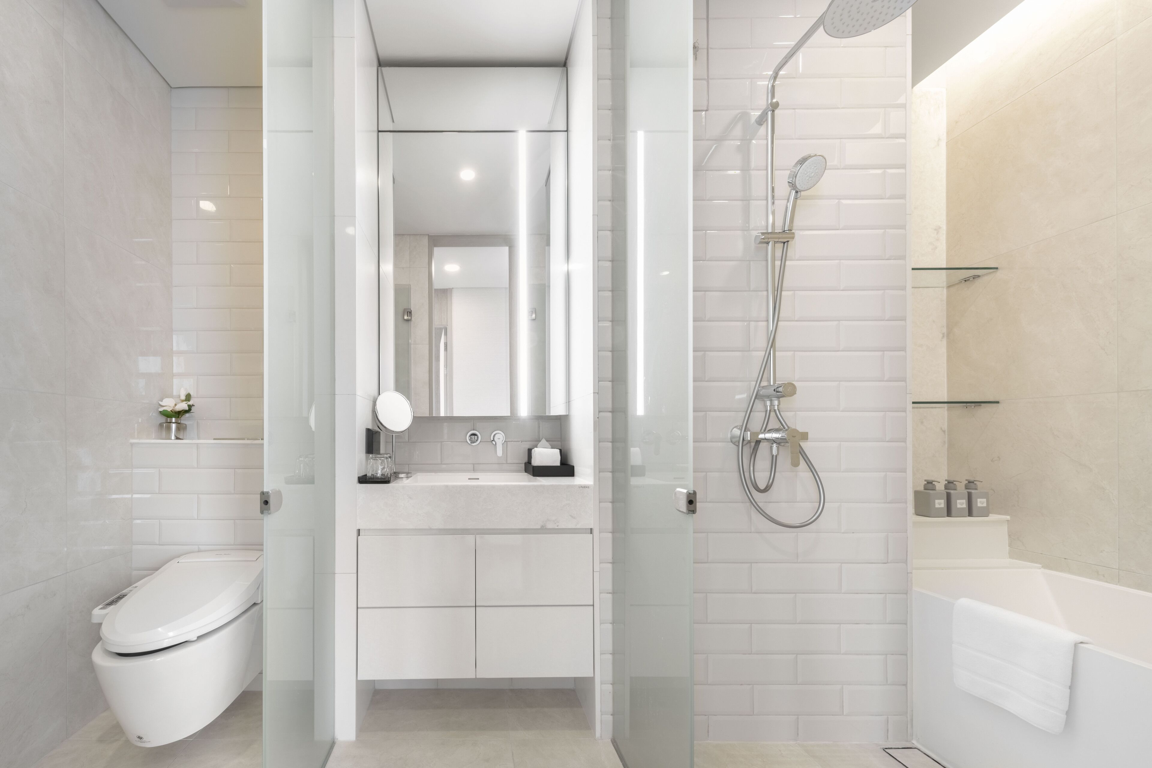 rainfall showerhead, hair dryer, bathrobes, slippers