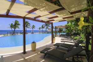 2 outdoor pools - Luxury Apartament Punta Roca Ocean Front (Puerto Aventuras)