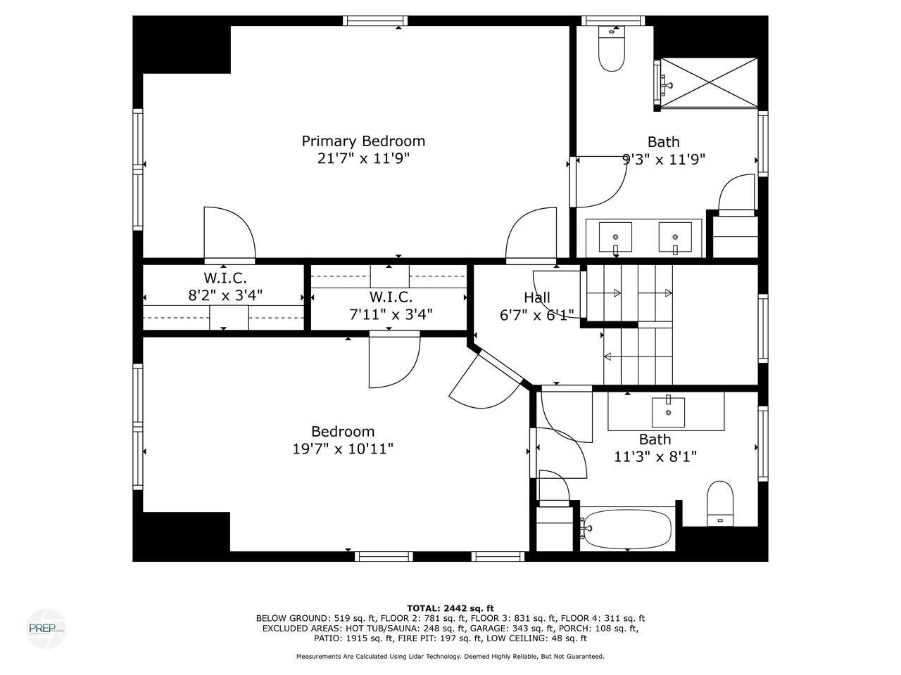 Un plan d’étage d’une maison comprenant une chambre principale, deux salles de bain, un hall et une chambre.