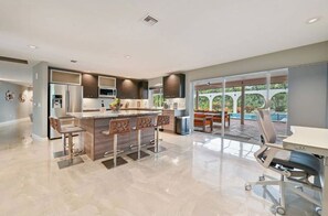 Fridge, microwave, oven, stovetop - Luxurious Naples Home. Heated Pool. Mins to Beach. (Naples)