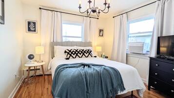 1 bedroom, desk, iron/ironing board, travel crib