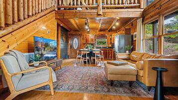 Smart TV, fireplace, table football, books