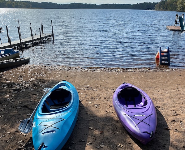 Enjoy serene lakeside views and easy access to kayaks for a relaxing getaway.
