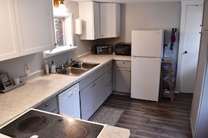 Enjoy cooking in this kitchen with appliances, a double oven, and a refrigerator.