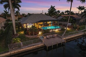 A heated pool - Dock overlooking Canal, Kayaks, Hot Tub, Large Pool - The Palms - Roelens Vacations (Cape Coral)
