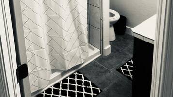 Shower, towels, toilet paper