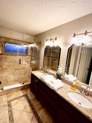 Shower, hair dryer, towels, soap
