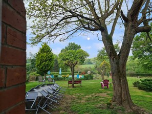 Outdoor dining - Idyllic Farmhouse Retreat with Private Pool, Fishing Pond, and Family Amenities in Berry (Vigoulant)