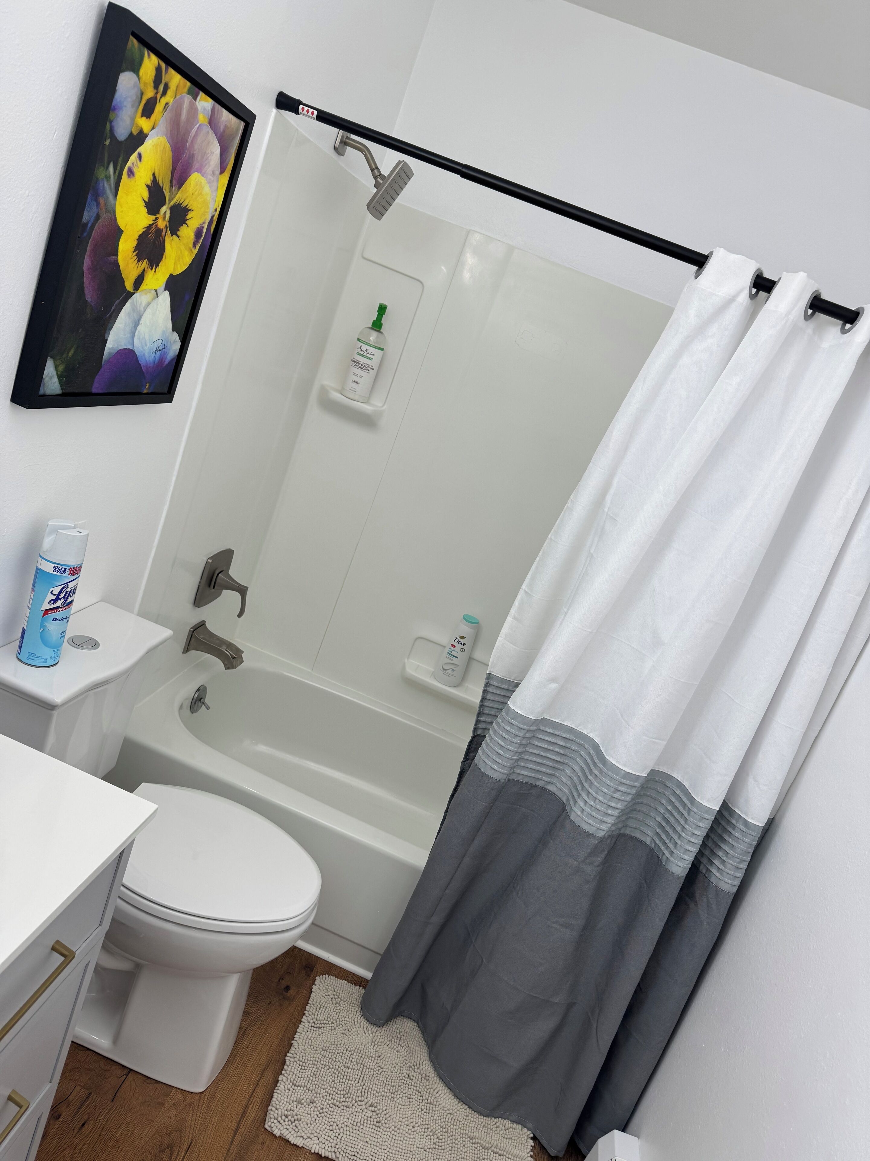 Combined shower/tub, hair dryer, towels, soap