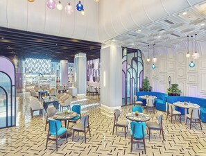 Breakfast, lunch, dinner served; local and international cuisine 