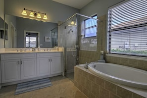 Bathtub, hair dryer, towels - Beautifully Furnished Single Family Pool Home with Lake View  in Gateway (Fort Myers)