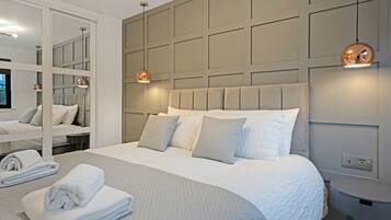 1 bedroom, desk, iron/ironing board, travel crib