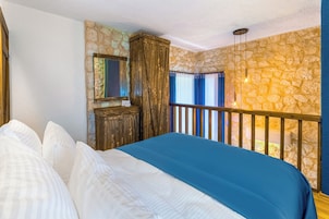 Villa Premium, varias camas, vistas al jardín | Edredones de plumas, minibar, caja fuerte y sistema de insonorización