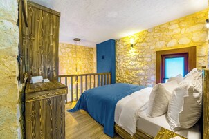 Villa Premium, varias camas, vistas al jardín | Edredones de plumas, minibar, caja fuerte y sistema de insonorización