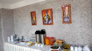 Habitación cuádruple de lujo | Zona de estar