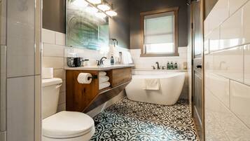 Bathtub, hair dryer, towels