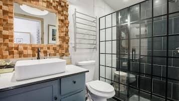 Bathtub, hair dryer, towels, soap
