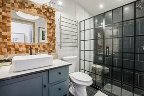 Bathtub, hair dryer, towels, soap