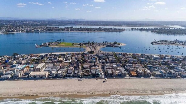 An aerial view of a coastal town with a beach, marina, and residential area. - Mission Beach Steps to Beach Remodeled Home with AC, fireplace, and Parking (San Diego)