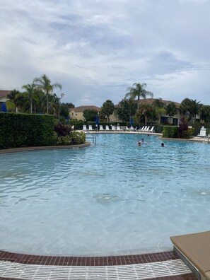 Outdoor pool, a heated pool - Cozy Condo 2.5 Miles from Disney! (Kissimmee)