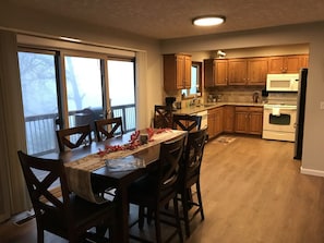 Enjoy cooking in this well-equipped kitchen with an oven, microwave, and sink.