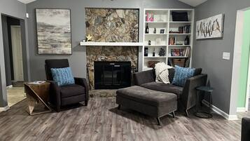 Smart TV, fireplace, table tennis, books