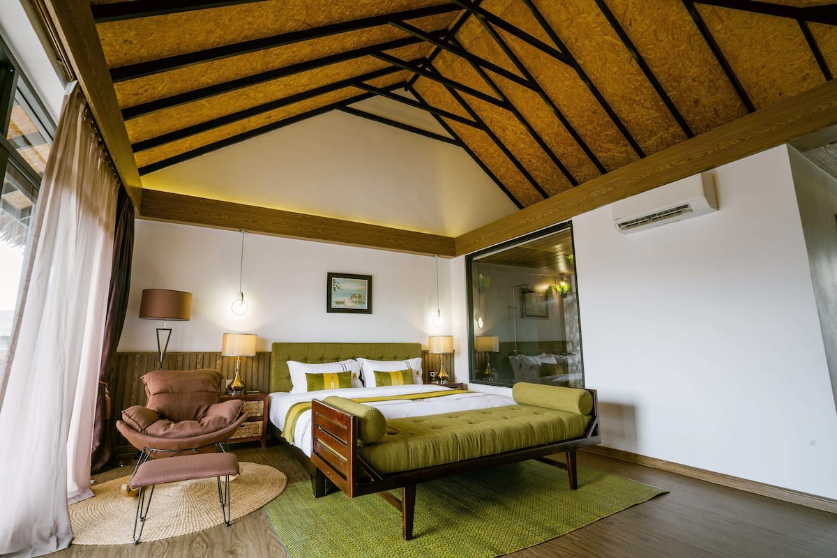 Premium Double Room | 1 bedroom, minibar, in-room safe, individually decorated