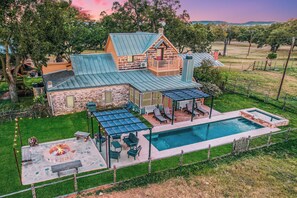 A heated pool - Private Ranch | Pool, Spa & Game Barn on 22 Acres (Fredericksburg)