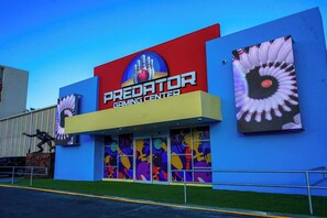 A building with a sign reading 'Predator Gaming Center.'