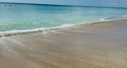 Luxury Beach Condo | 5 Min Walk to Beach & Shops!