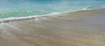 Luxury Beach Condo | 5 Min Walk to Beach & Shops!