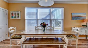 Enjoy meals in this cozy dining area with a large oval table and comfortable seating for four.