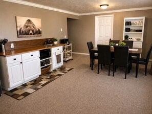 Coffee/tea maker, fridge, microwave, oven