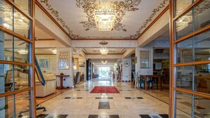 A grand lobby with a marble floor, ornate ceiling, and a chandelier. - My Marina Select Hotel (Datça)